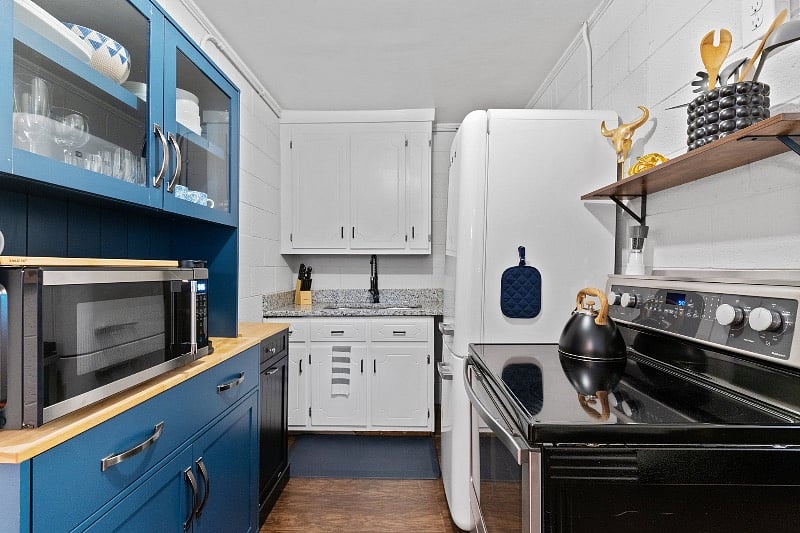 Kitchen is fully stocked and also has stylish Smeg fridge