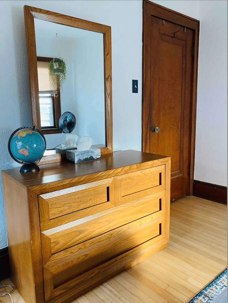 Full closet and dresser in main room.