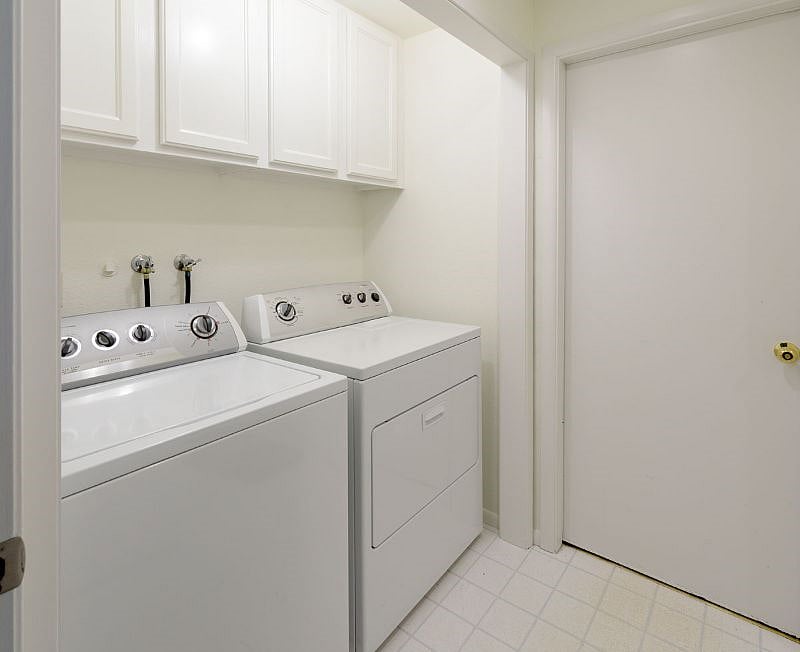 Laundry room between garage and kitchen