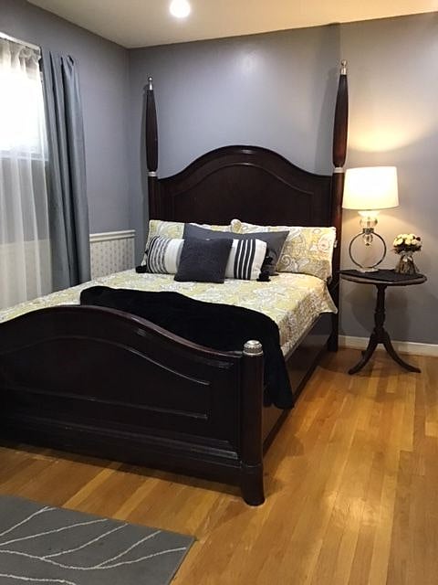 Br 2= Master sized Bedroom w/ Queen. 2nd closet. 2, 6' wide, high windows.