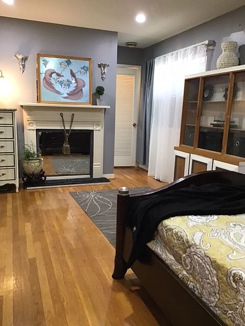 Faux Fireplace. Half bath behind wall, 2nd, deep closet.