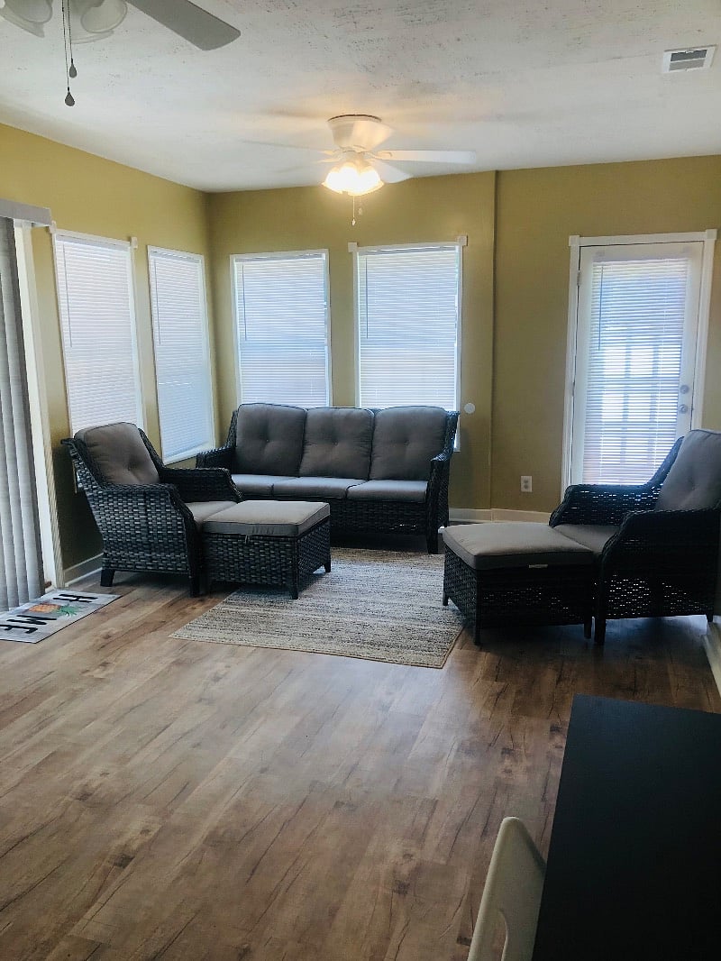 Our Georgia room/sunroom, overlooking the swimming pool area and the back yard.