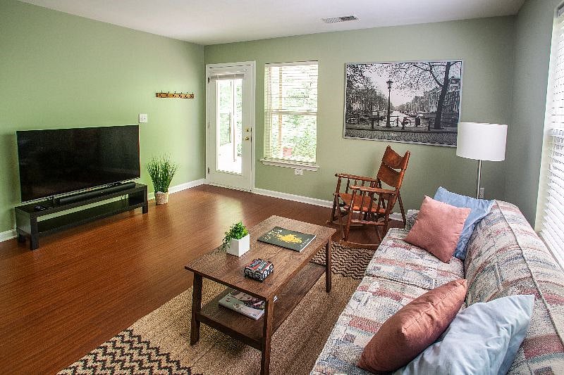 Living room with pull out sofa and 55" HD Roku TV with Netflix and Youtube TV streaming. Love seat has now been added.