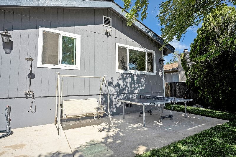 Ping Pong Table / Swing in Front of Garage area