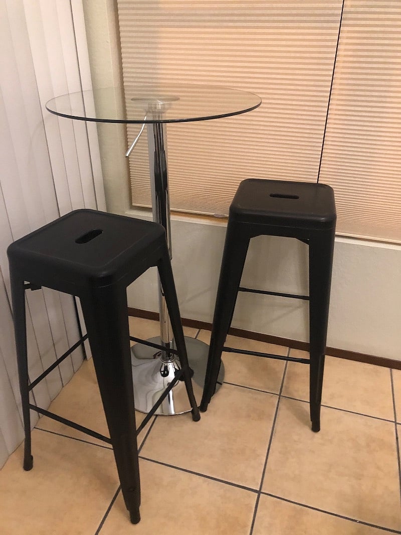 Glass table can go inside or out