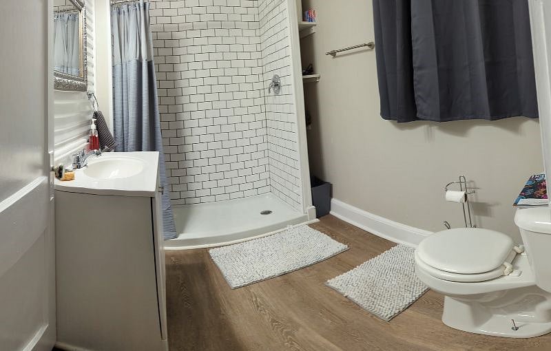 Main floor fully tiled shower bathroom