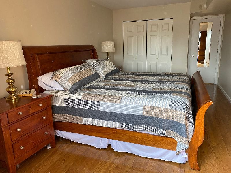 The one-bedroom features a king-sized bed, dual nightstands with 3-way lighting for nighttime reading.