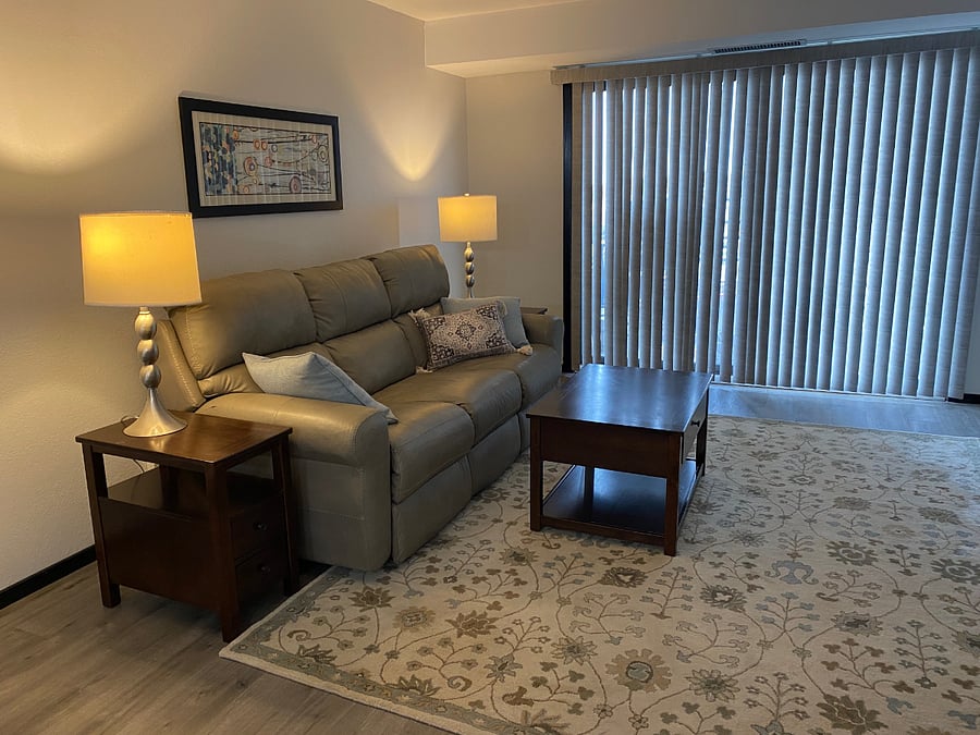 The leather sofa electrically reclines on each end and features USB ports to charge your electronics while you relax.