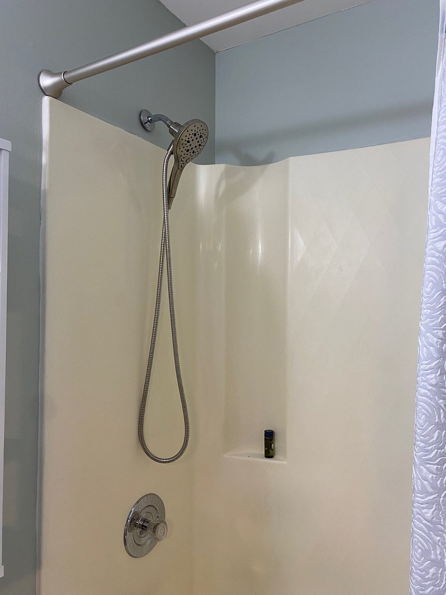 The bath/shower has great water pressure and features a showerhead with a hand-held.