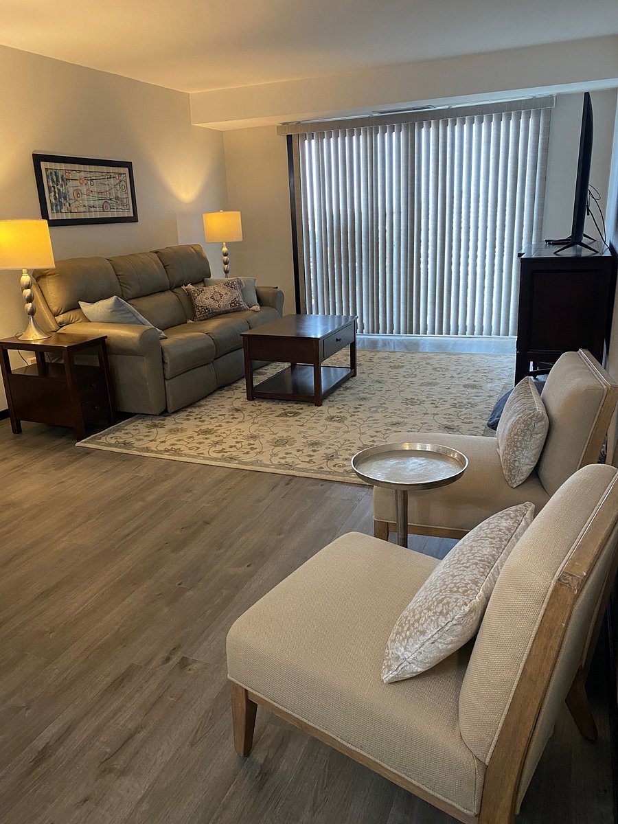 The livingroom is welcoming and functional.  To the right, there are 2 comfortable chairs for reading, or enjoying a hot or cold drink while visiting with a friend!