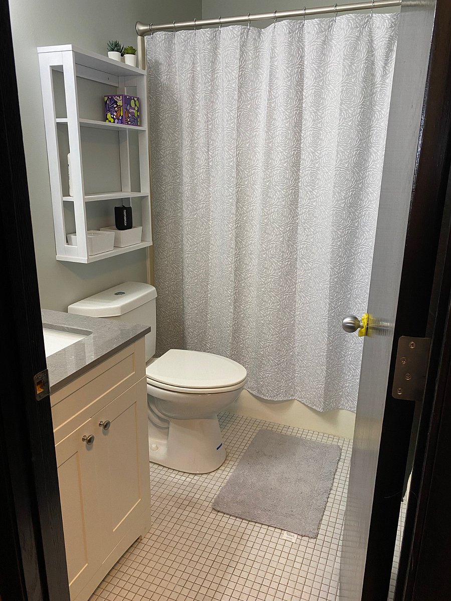 While the bathroom is small, it is very functional and features great lighting.