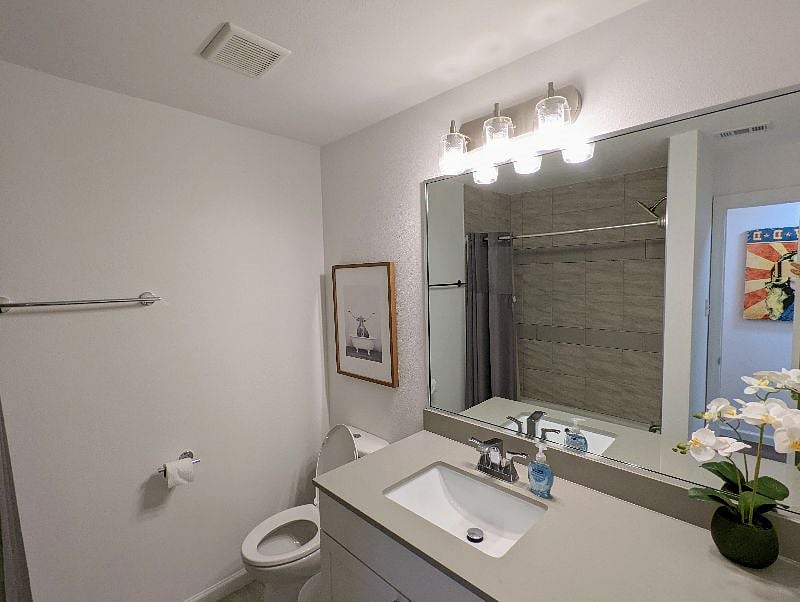 Guest bathroom - full bath with lots of storage, entire condo recently remodeled including kitchen and baths