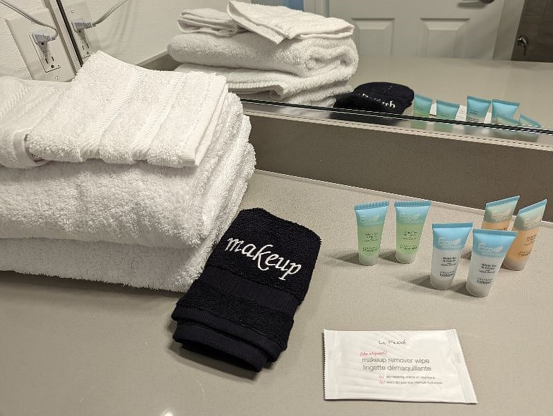 Two sets of towels and sheets provided for each guest plus starter toiletries