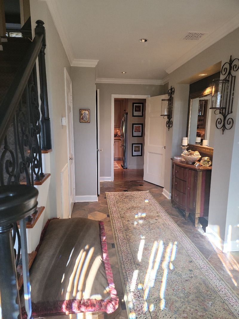 Entry hall looking into the kitchen