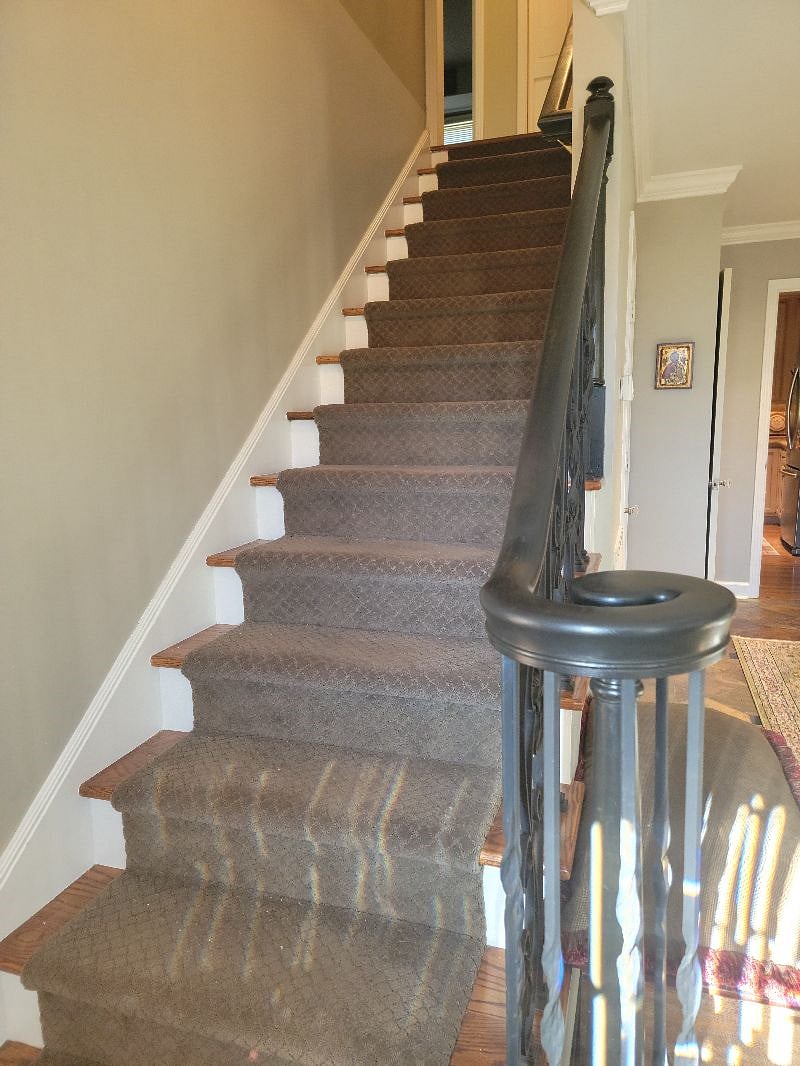 Stairs leading up to bedrooms and bath