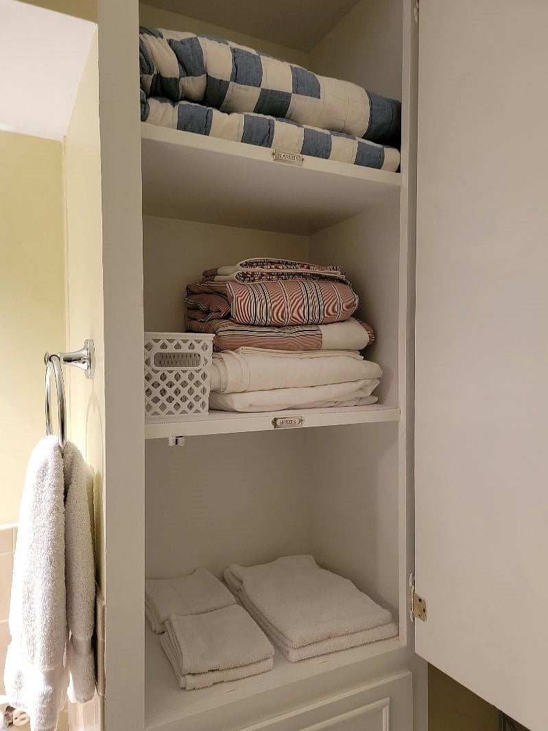 Your bath storage closet holds extra quilts and towels