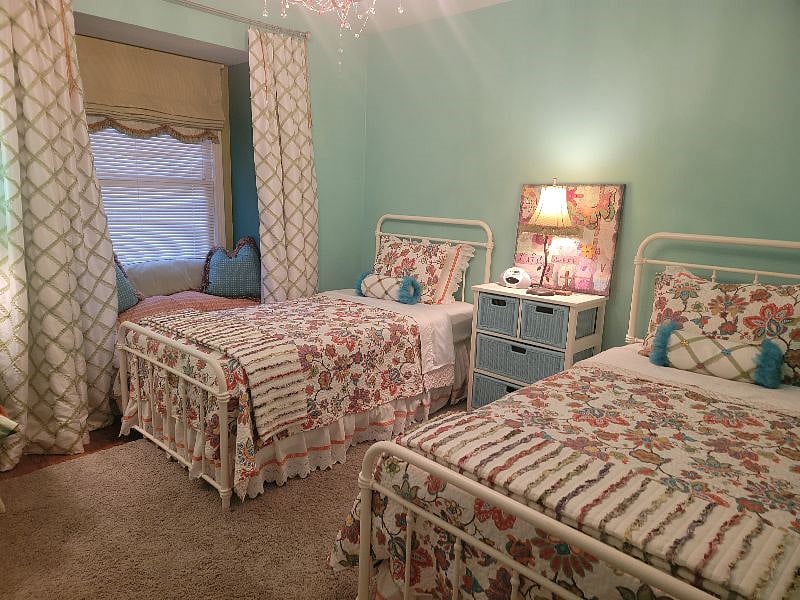A second bedroom is also available, offering two twin beds