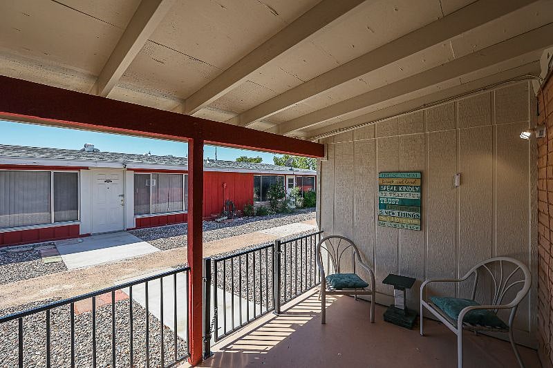 Covered And Gated Back Patio