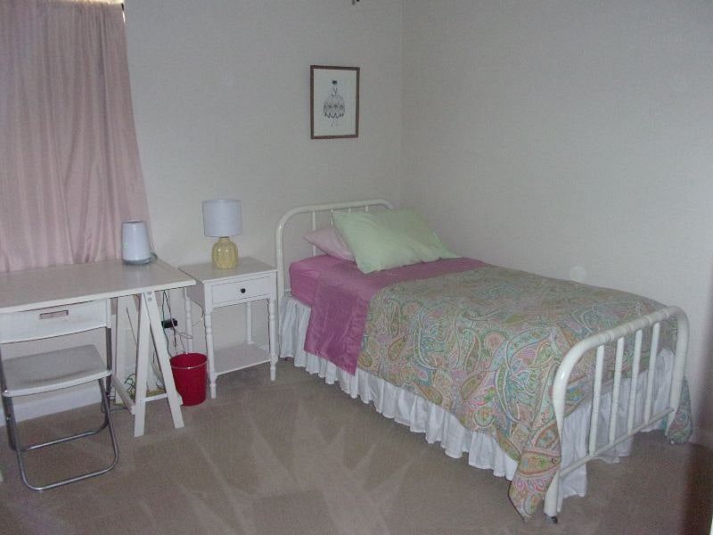3rd bedroom with antique twin bed. 