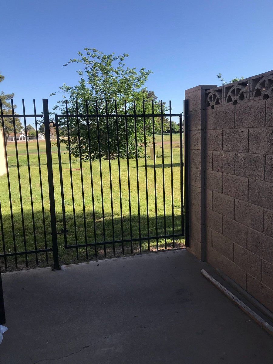Patio gate to golf course.
