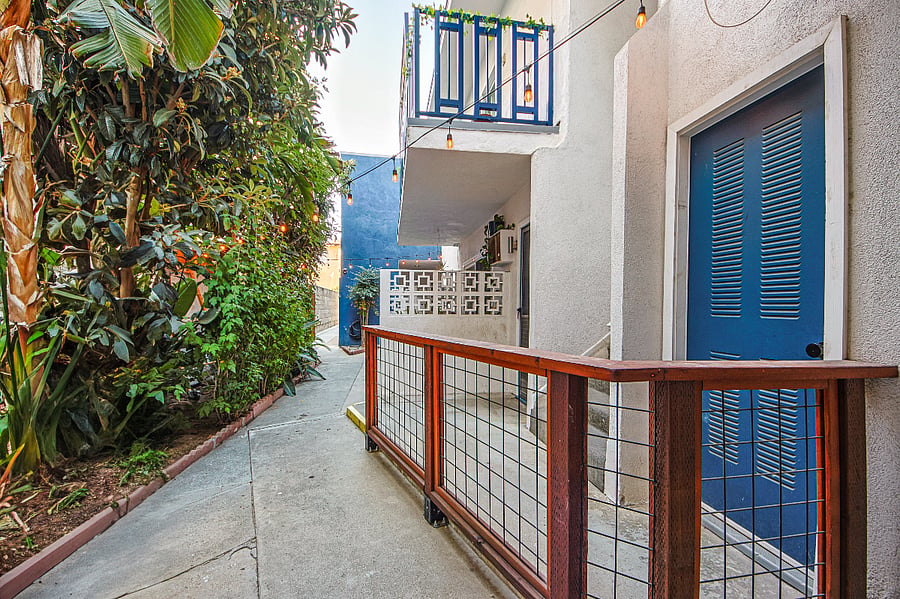 Courtyard entrance with patio lights that illuminate in the evening