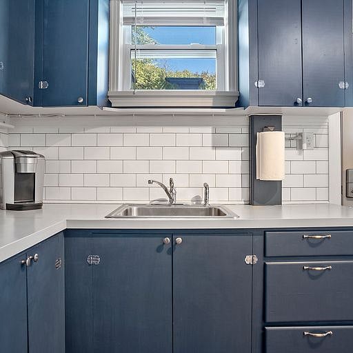 The kitchen also includes ample counter space for meal prep, making it easy to cook efficiently even during busy mornings or late evenings.