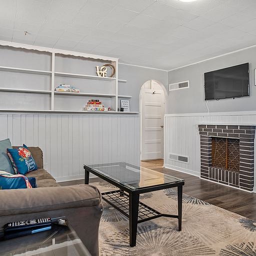 A warm fireplace adds a touch of charm and creates a relaxing atmosphereideal for chilly Rapid City nights.