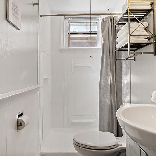The clean, modern fixtures and fresh, welcoming dcor create a spa-like atmosphere, ensuring that every guest feels comfortable and at home.