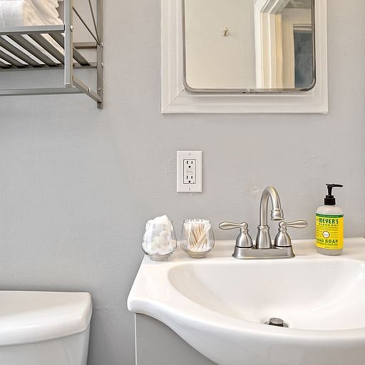 Bright and well-lit, the space is thoughtfully arranged with ample storage for your personal items, making it easy to stay organized throughout your stay.