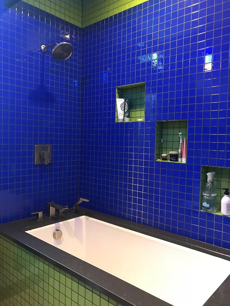 Bathroom off bedroom - primarily used by renter - Deep tub + shower