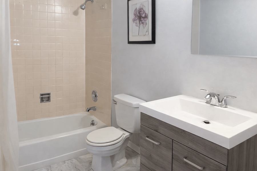 Full size bathub and updated vanity.
