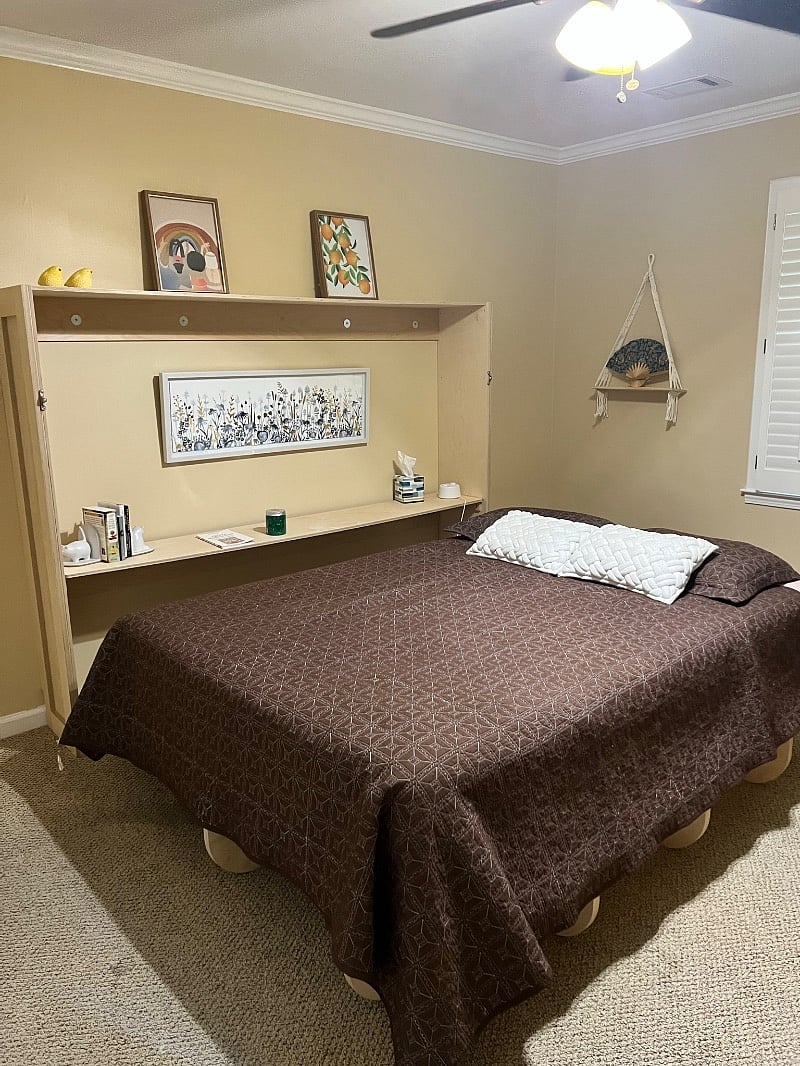 Queen bed in large bedroom. This is Murphy wall bed folds up into wall unit next to it. If you need to bring your own bed or mattress, the wall bed will fold up and the wall bed functions as a shelf unit. The mattress provided is hybrid memory foam and metal coils and is of medium softness.