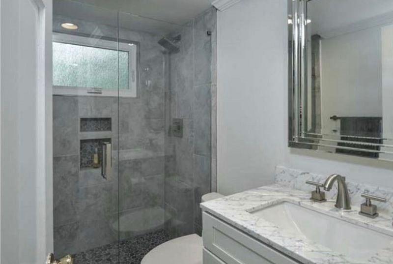 Basement bathroom with shower, sink, toilet. A bathtub is available in main house upstairs if needed.
