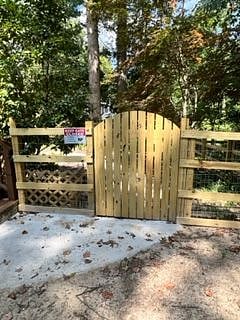 Second gate in backyard enclosing your private patio with fire pit. No animals can go there!