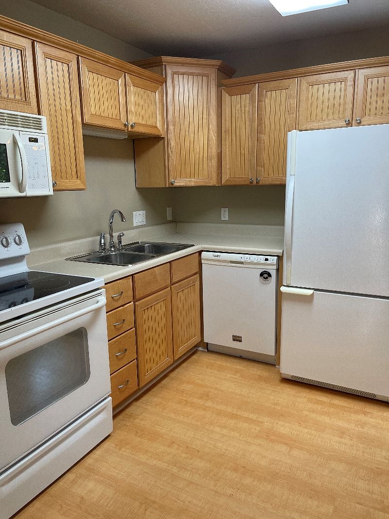 Kitchen with island and nice appliance package. Washer and Dryer are in the unit.