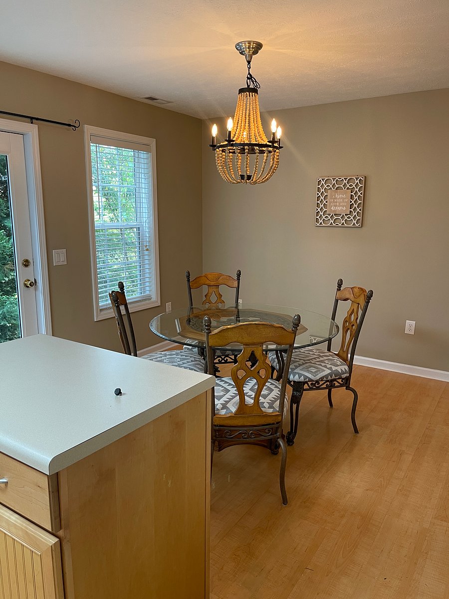 Dining area in kitchen.  Back deck is accessible from kitchen.