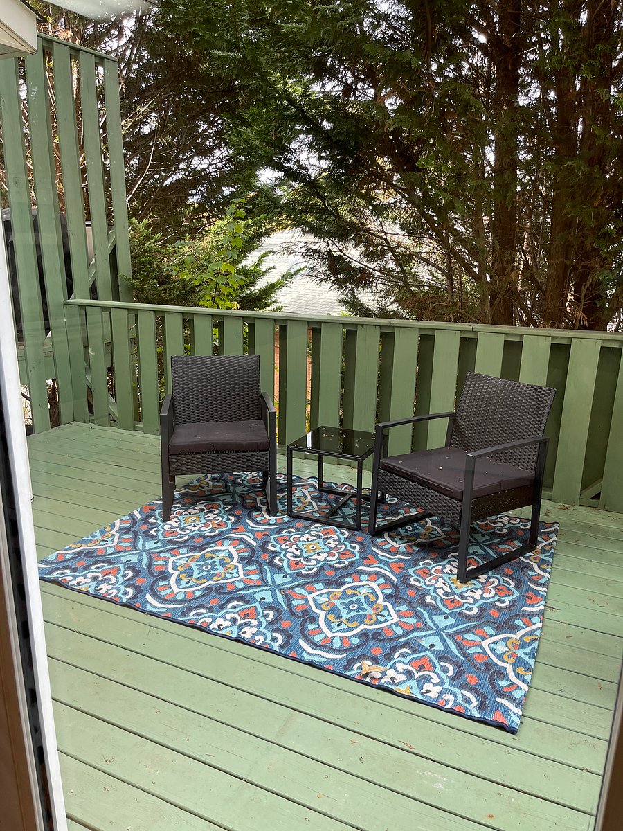 Out door private deck space with seating. 