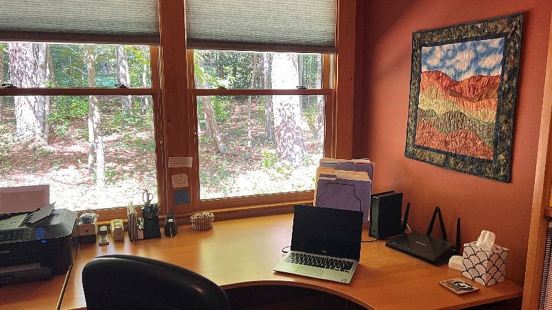 Office desk, including printer.