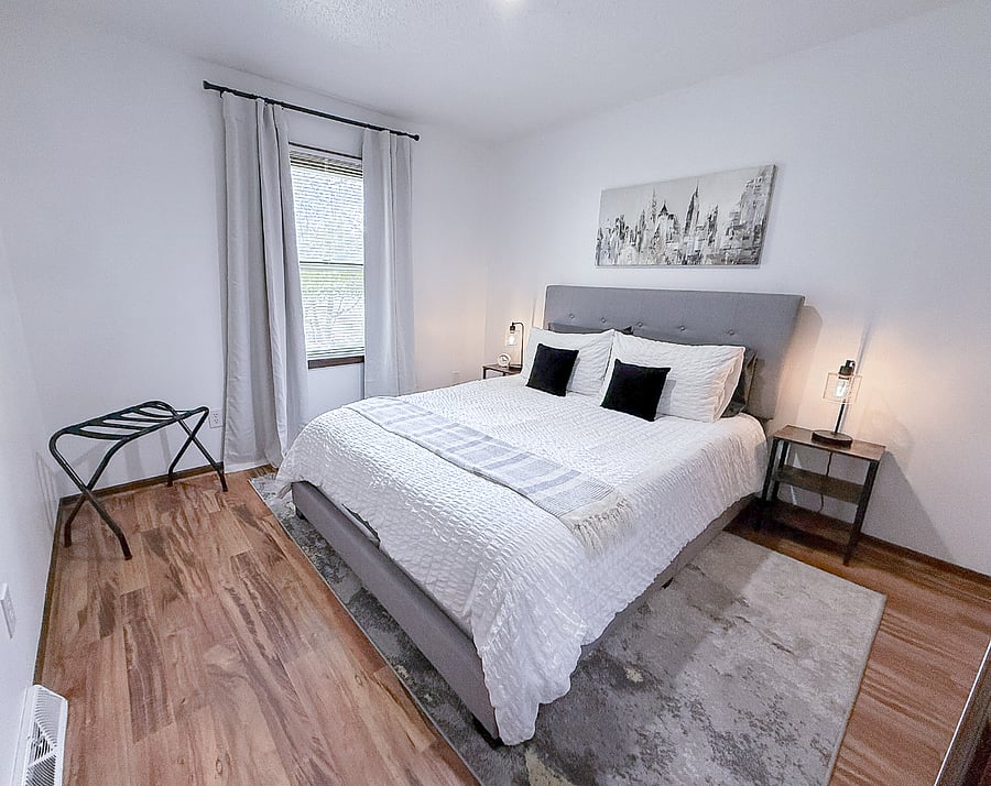 Bedroom 2 Featuring an Elegant Queen Bed & Plush Bedding