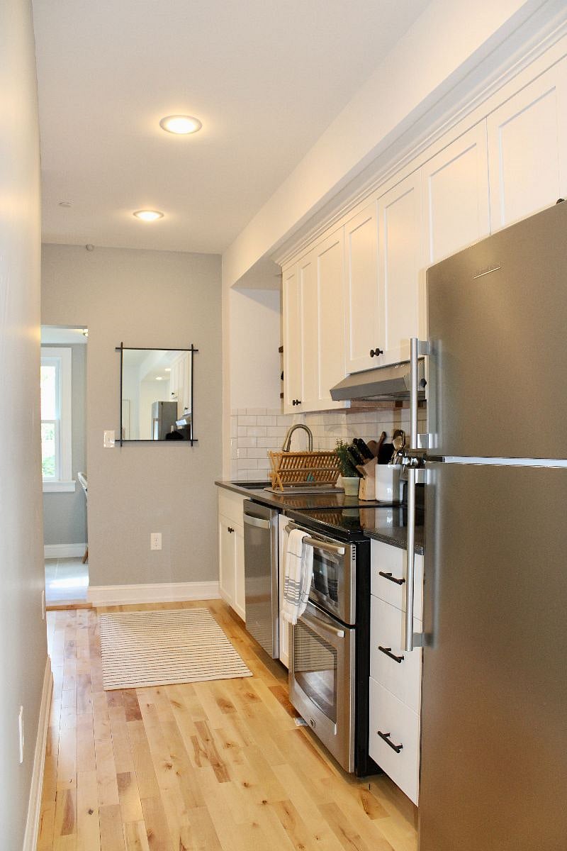 2nd floor: fully stocked galley kitchen off of living room