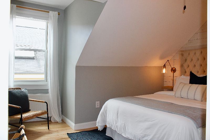 third floor: cozy queen bedroom with smart tv and closet