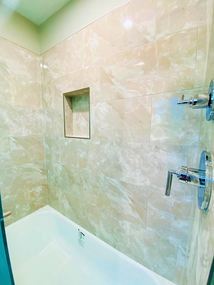 Shower with brand new tub. 