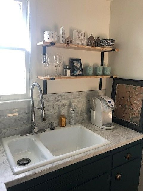 open shelving and stocked kitchen
