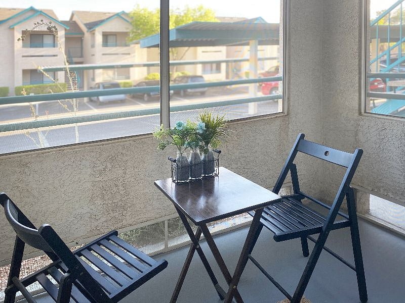 Enclosed and screened balcony off of living area