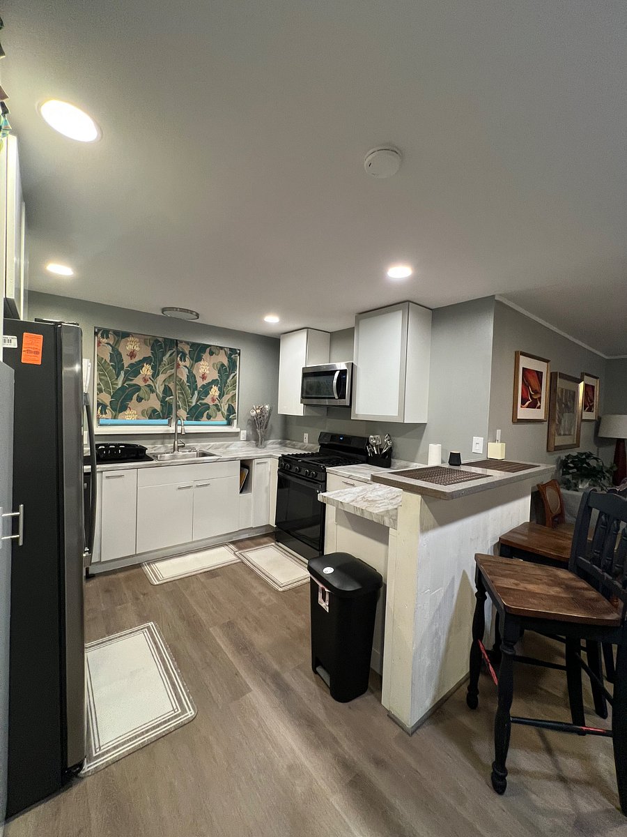 Kitchen with basic necessities, including a gas stove.