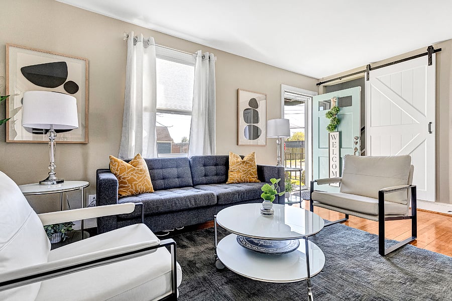 A super comfortable couch and hardwood floors create an elevated feel, guests say it truly feels like home!