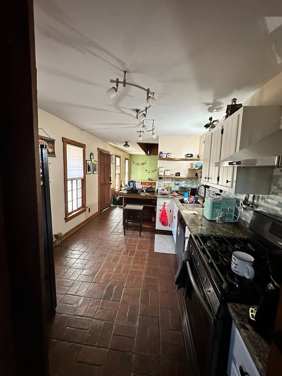 Standing in doorway of Laundry Room