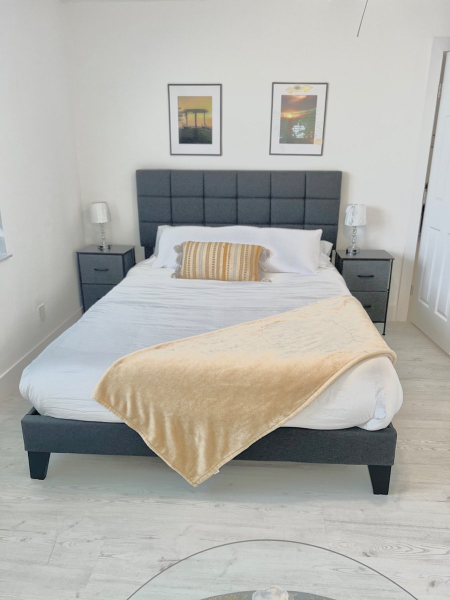 Primary bedroom queen size hybrid gel mattress on poster board