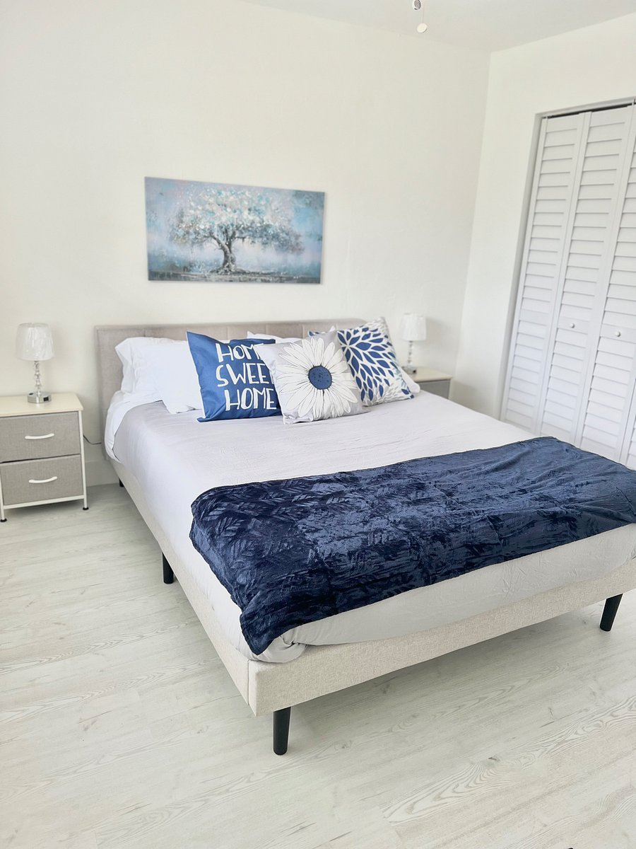 2nd bedroom with queen size hybrid gel mattress and posterboard