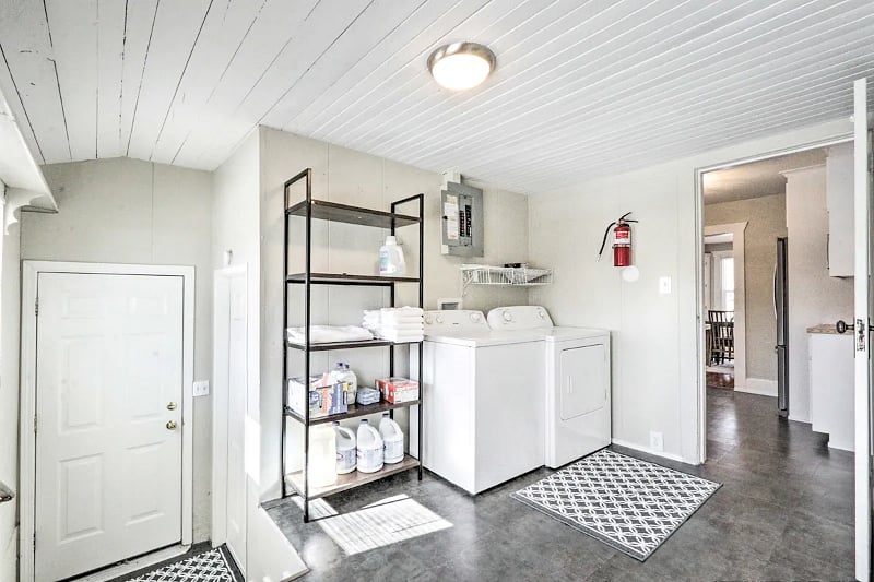 Laundry room with storage.